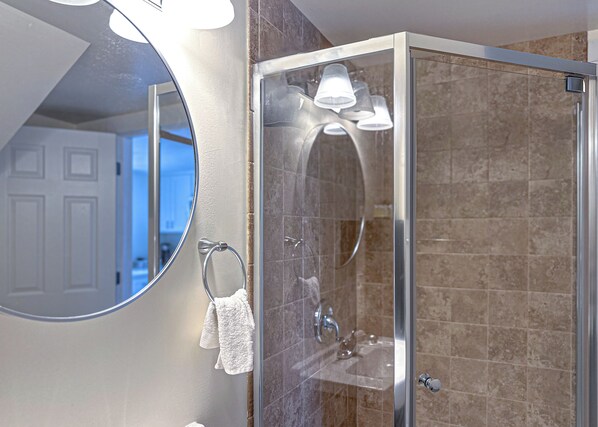 Shower, hair dryer, towels, soap