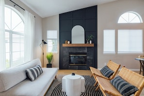 Smart TV, fireplace, books