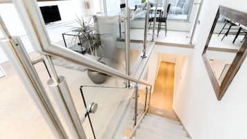 Luxury Apartment | Living area | 32-inch flat-screen TV with digital channels, TV