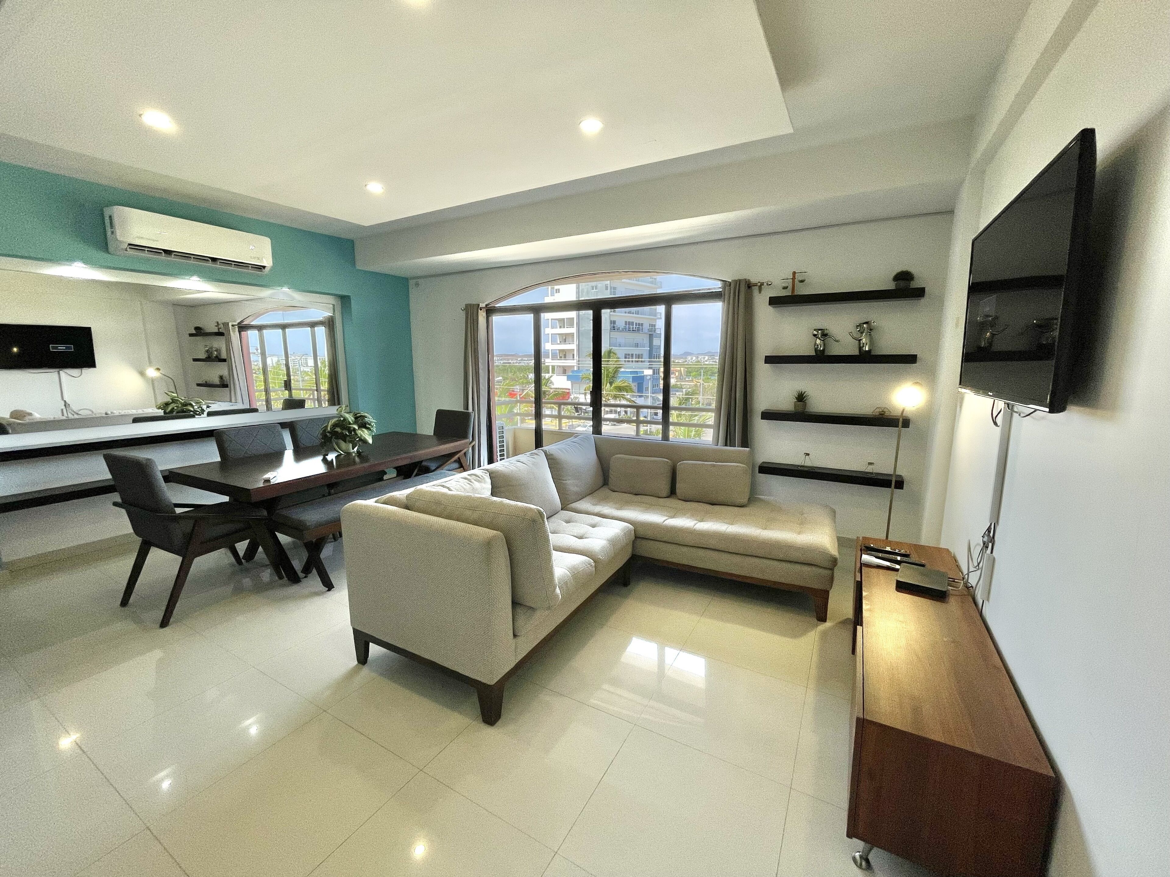 Superior Apartment | Living area | 50-inch plasma TV with digital channels, TV