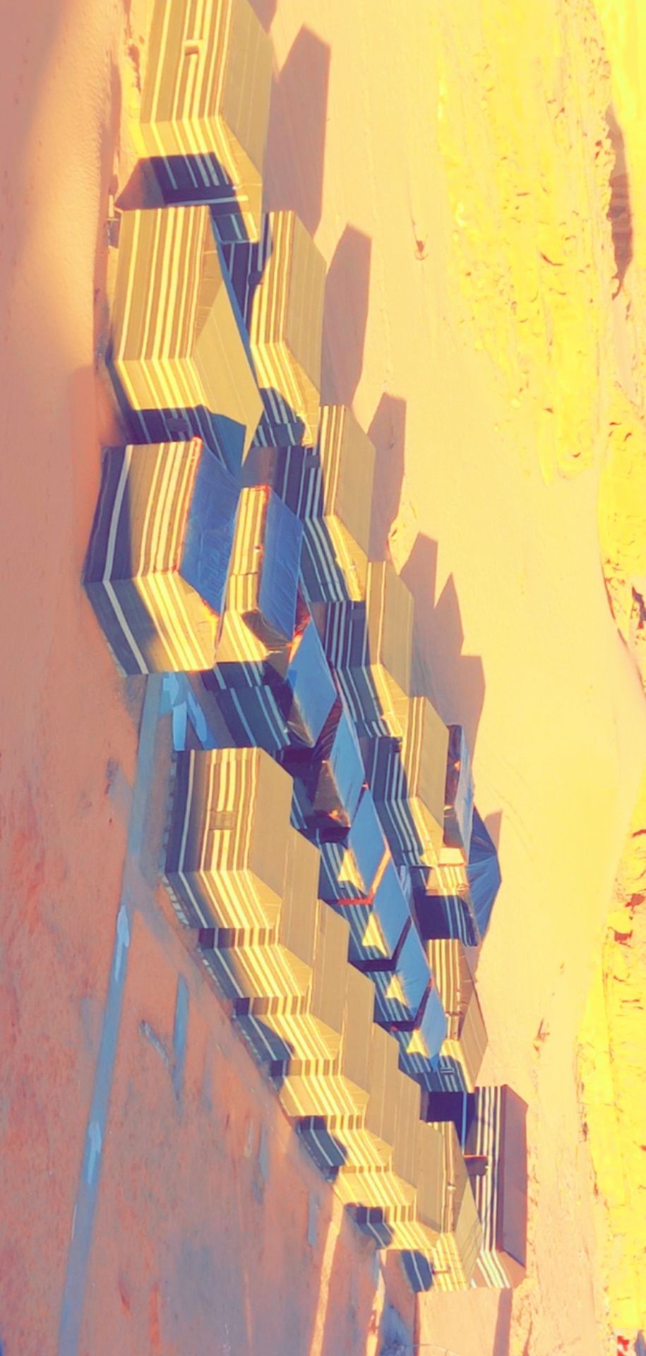 A geometric, abstract structure with multiple levels and angular shapes.