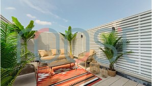 A modern outdoor seating area with a sofa and chairs, surrounded by potted plants and a patterned rug. - Luxury Notting Hill Flat with Patio (London)