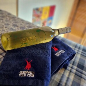 Shower, free toiletries, slippers, towels