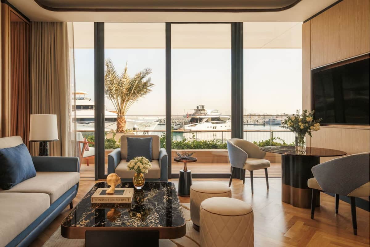 Promenade Deluxe Suite - Butler Service, Iliana Pool Club Access, Private Terrace on Promenade | Living area | 65-inch Smart TV with digital channels, toys