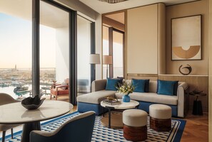 Marina Deluxe Suite - Butler Service, Iliana Pool Club Access, 31 sqm Terrace with Marina Views | Living area | 65-inch Smart TV with digital channels, toys - Jumeirah Marsa Al Arab Dubai (Dubai)