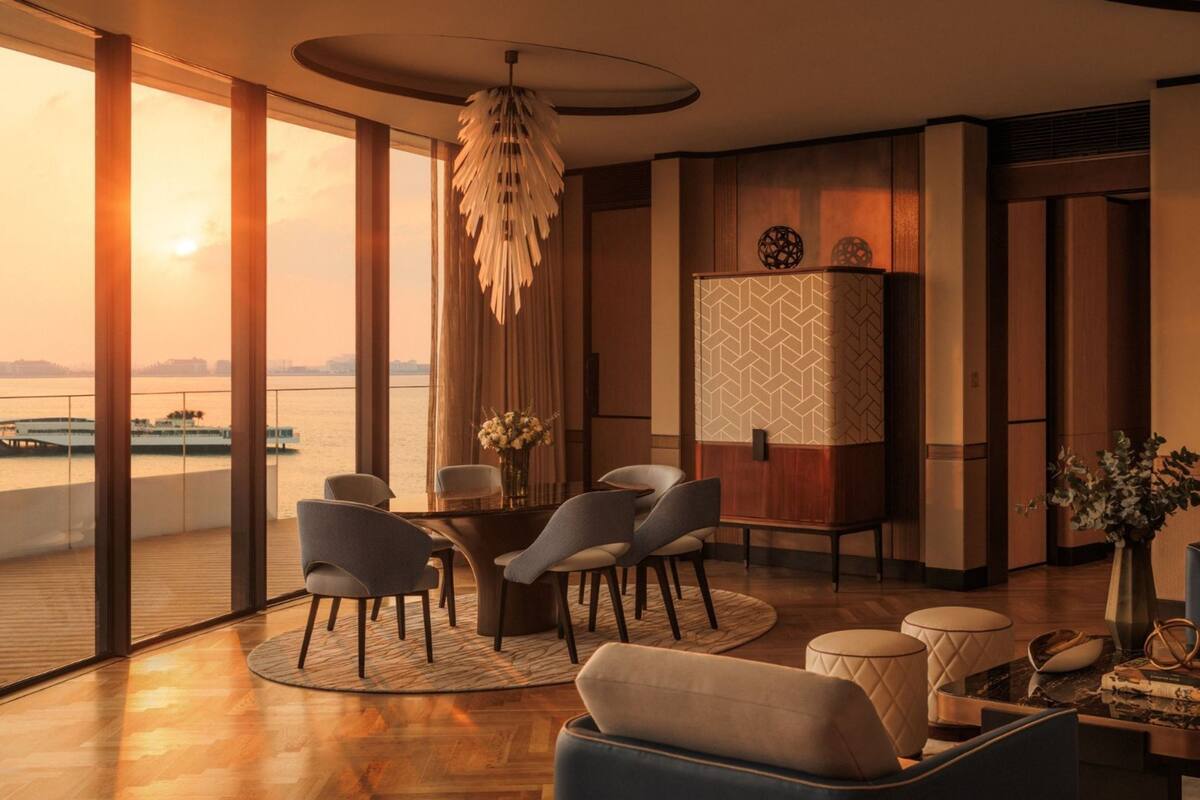 Ocean Terrace Suite - Private Butler, Iliana Pool Club Access, Large Terrace with Panoramic Views | Living area | 65-inch Smart TV with digital channels, toys