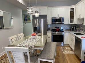 Apartment - 2nd Floor | Private kitchen | Full-size fridge, microwave, oven, dishwasher - Wrigleyville Inn (Chicago)