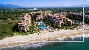 On the beach, sun loungers, beach towels
