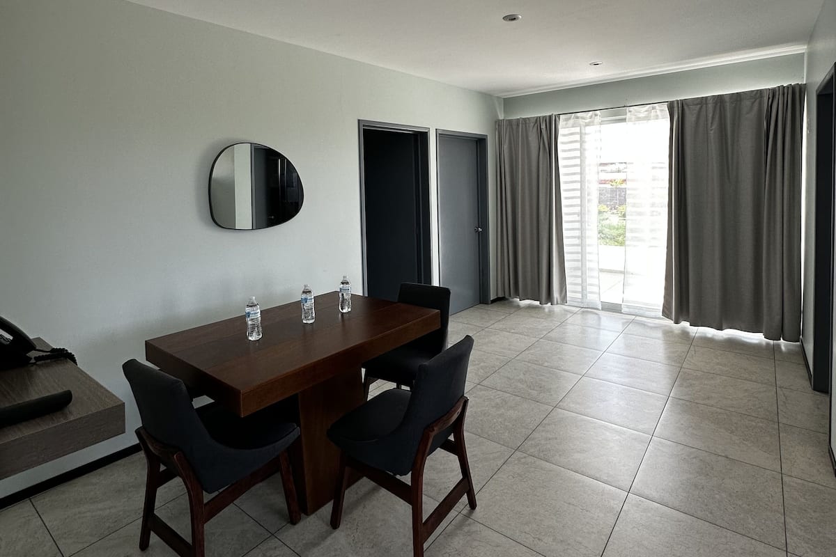 Family Apartment | Living area | 55-inch Smart TV with satellite channels, TV