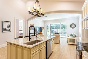 Interior - Imola: Remodeled, family-friendly 4BR home with private pool near beach & Mercato. Sleeps 8 in comfort - perfect for sunny days, BBQs, and quality time together. Book your Naples vacation today! (Naples)