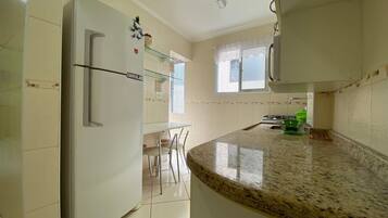Classic Apartment, 1 Bedroom | Private kitchen | Full-sized fridge, microwave, stovetop, coffee/tea maker