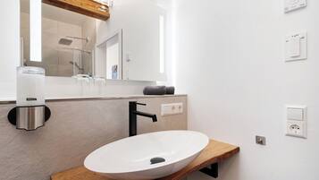 Bathtub, hair dryer, towels