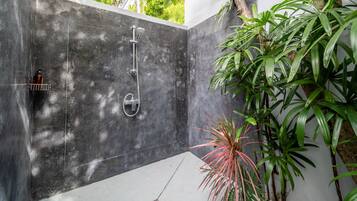 Shower, hair dryer, towels, soap
