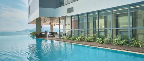 Indoor pool, open 9:00 AM to 6:00 PM, pool loungers