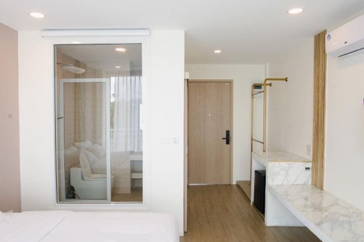 Premium bedding, blackout drapes, soundproofing, WiFi (free)