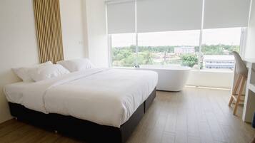 ห้องเอ็กซ์คลูซีฟ | เครื่องนอนระดับพรีเมียม, ผ้าม่านกันแสง, ห้องเก็บเสียง, Wi-Fi ฟรี