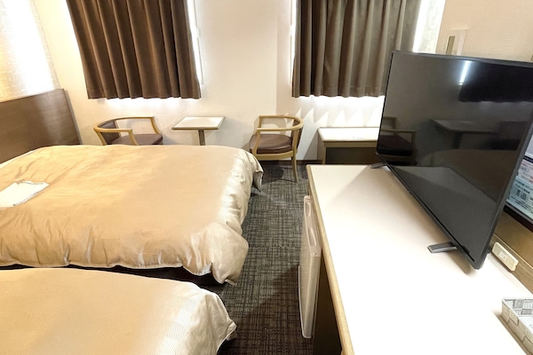 Down duvets, desk, laptop workspace, blackout curtains
