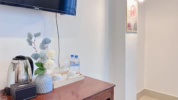 32-inch flat-screen TV with cable channels, TV