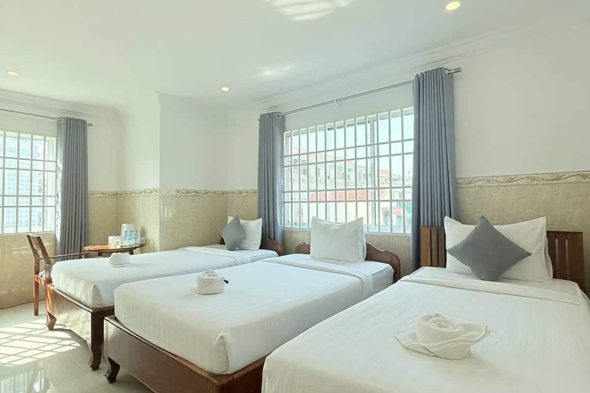Standard Triple Room | Minibar, in-room safe, free WiFi, bed sheets