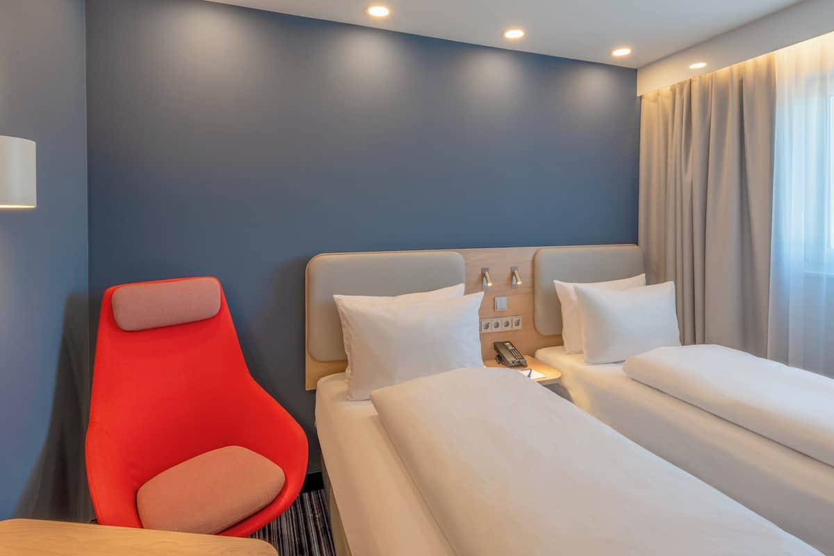 Premium bedding, Select Comfort beds, desk, blackout drapes