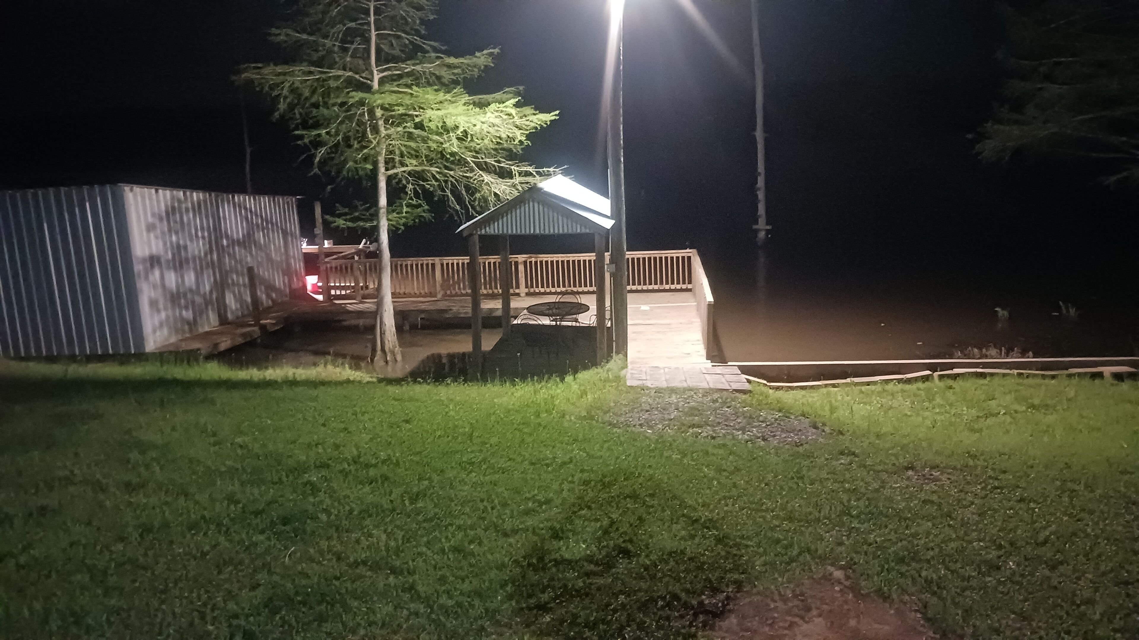 dock and boathouse at nighttime
