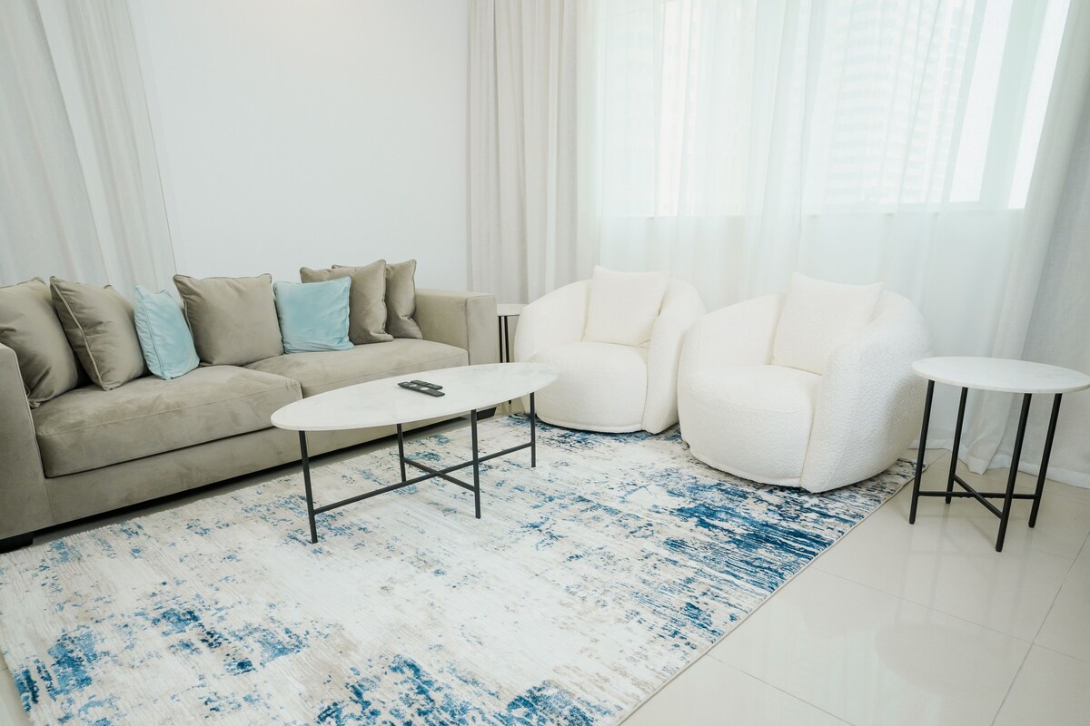 Elite Apartment | Living area | 65-inch Smart TV with cable channels, TV