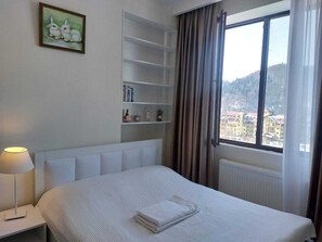 1 chambre, fer et planche à repasser, Wi-Fi gratuit, draps fournis