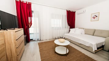 Exclusive Apartment | Living area | TV