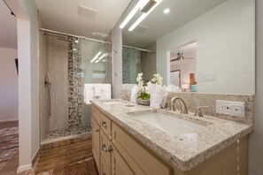 Bathtub, hair dryer, towels