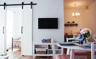 Apartamento exclusivo | Zona de estar | Televisión LCD de 40 pulgadas con canales digitales, una televisión