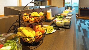 A buffet setup with various fruits and dishes. - Nikko Garden Hotel (Nasushiobara)