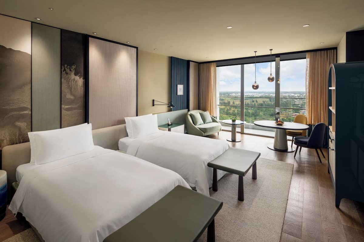 1 slaapkamer, luxe beddengoed, een minibar, een bureau
