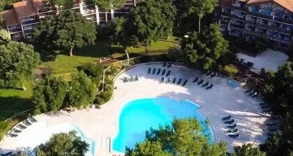 Sunny terrace overlooking golf course and forest.★