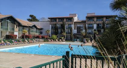Sunny terrace overlooking golf course and forest.★