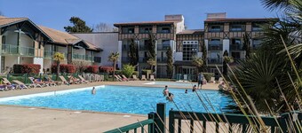 Sunny terrace overlooking golf course and forest.★