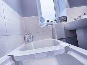 Hair dryer, towels, soap, shampoo