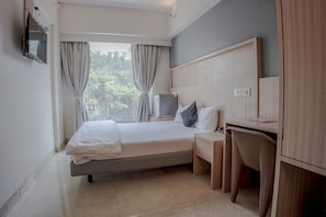 Quarto luxo | Quartos à prova de som, ferros/tábuas de passar roupa, Wi-Fi de cortesia