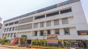 Experience the vibrant atmosphere of this hotel, featuring a cafe, balconies, and large windows.