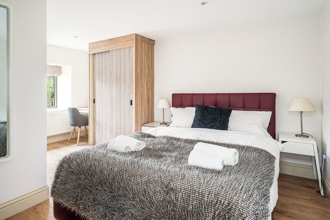 4 bedrooms, memory-foam beds, iron/ironing board, travel cot