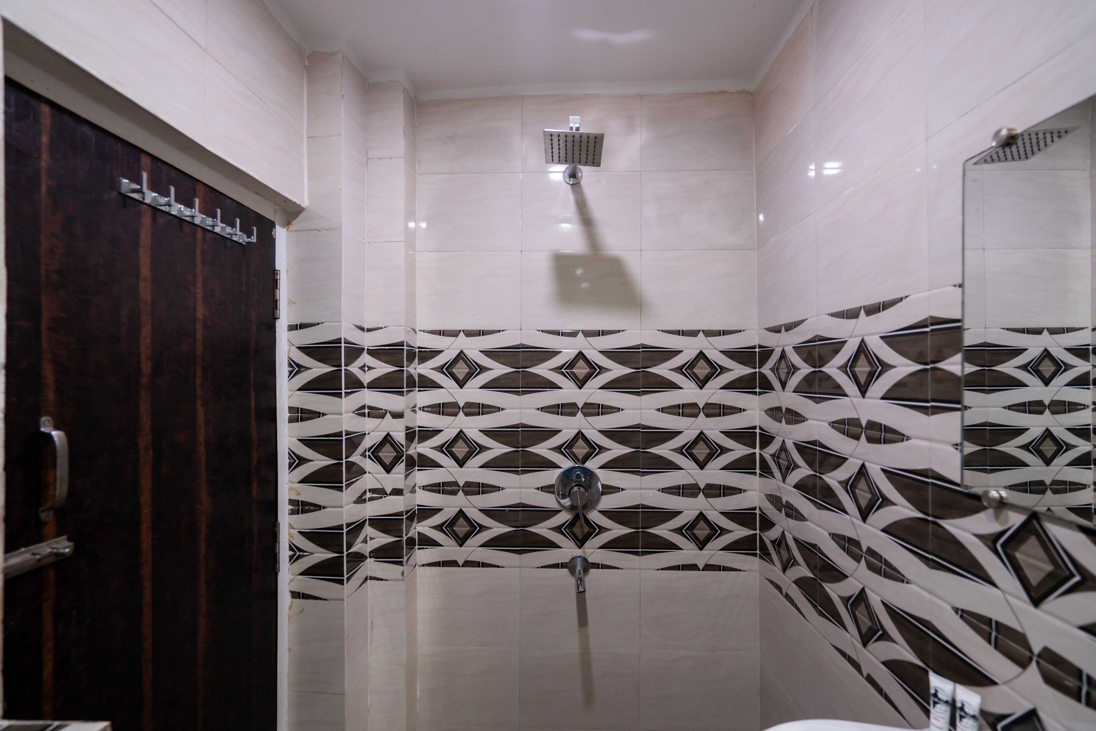 Shower, rainfall showerhead, towels, soap