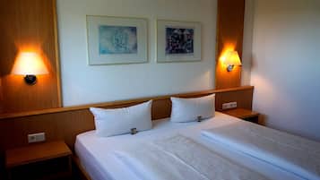 Economy Double Room | 1 bedroom, premium bedding, down duvets, minibar