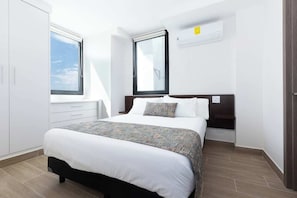 2 室のベッドルーム、旅行用ベビーベッド、WiFi (無料)、ベッドシーツ