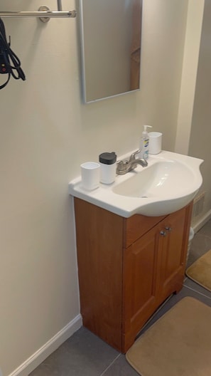 Hair dryer, bidet, towels, soap
