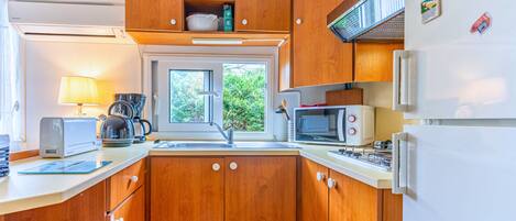 Refrigerador, microondas, parrilla de estufa y lavavajillas