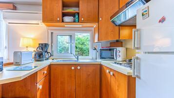 Refrigerador, microondas, parrilla de estufa y lavavajillas