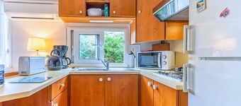 "Mobilhome Bord De Mer Gujan Mestras" with Shared Pool, Private Terrace & A/C