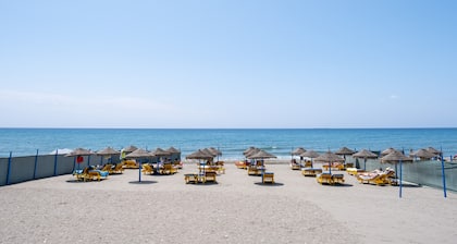 Holiday Home "Beachfront Bungalow" with Sea View, Private Terrace & Wi-Fi