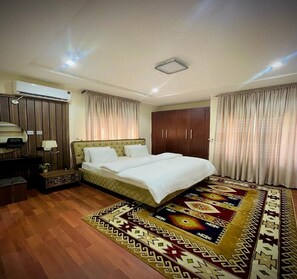 Executive Apartment | 3 bedrooms, in-room safe, iron/ironing board, free WiFi