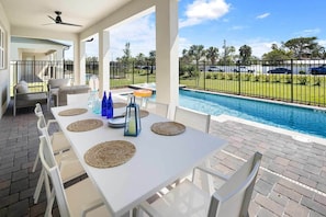 Outdoor dining - Aquatic Adventure | Beach Retreat w Pvt Pool, Casino, Theater, Ocean Themed BR (Melbourne Beach)