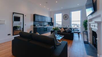 Executive-huoneisto | Oleskelualue | Taulutelevisio